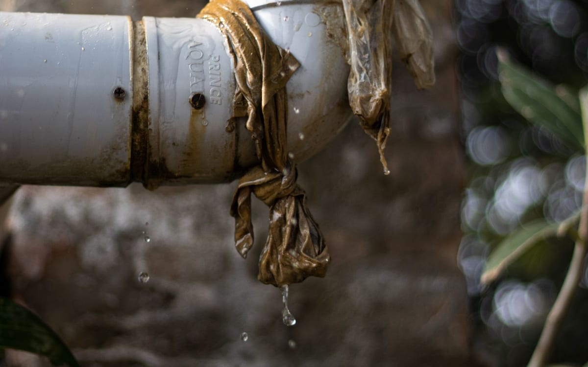 Water dripping from a damaged pipe