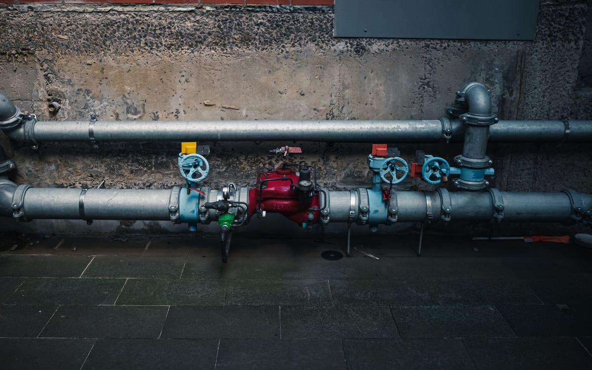 Commercial pipework and valves in a plant room
